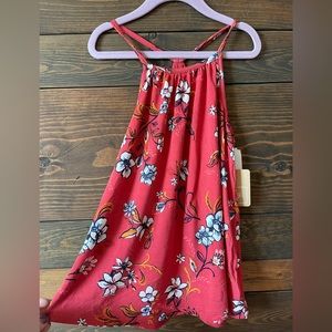 Bixby Nomad - Red Swing Tank 
The Strappy Swing Tank Size Medium 8